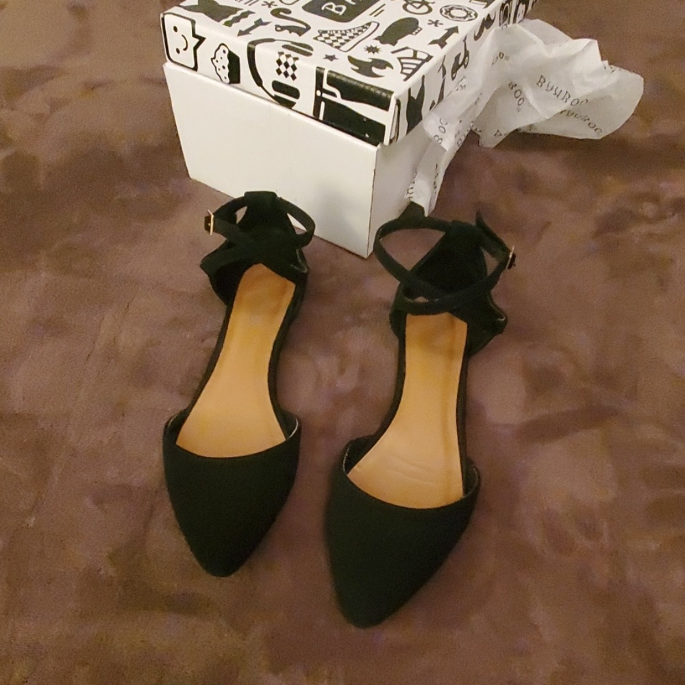 Black pointed ankle strap flats